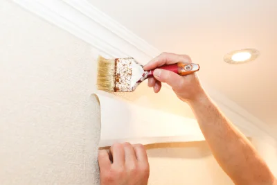Pose de papier peint aux Paroches — revêtements muraux et toiles de verre